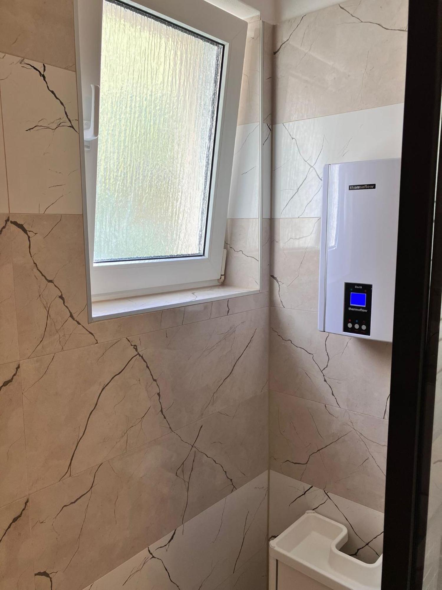 App Martina Apartment Драмал Екстериор снимка